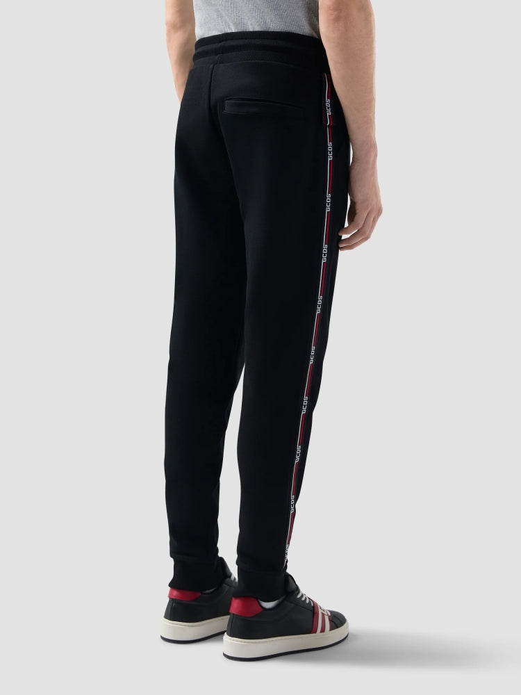 Gcds pantalone nero uomo unisex tuta in cotone bande laterali con logo