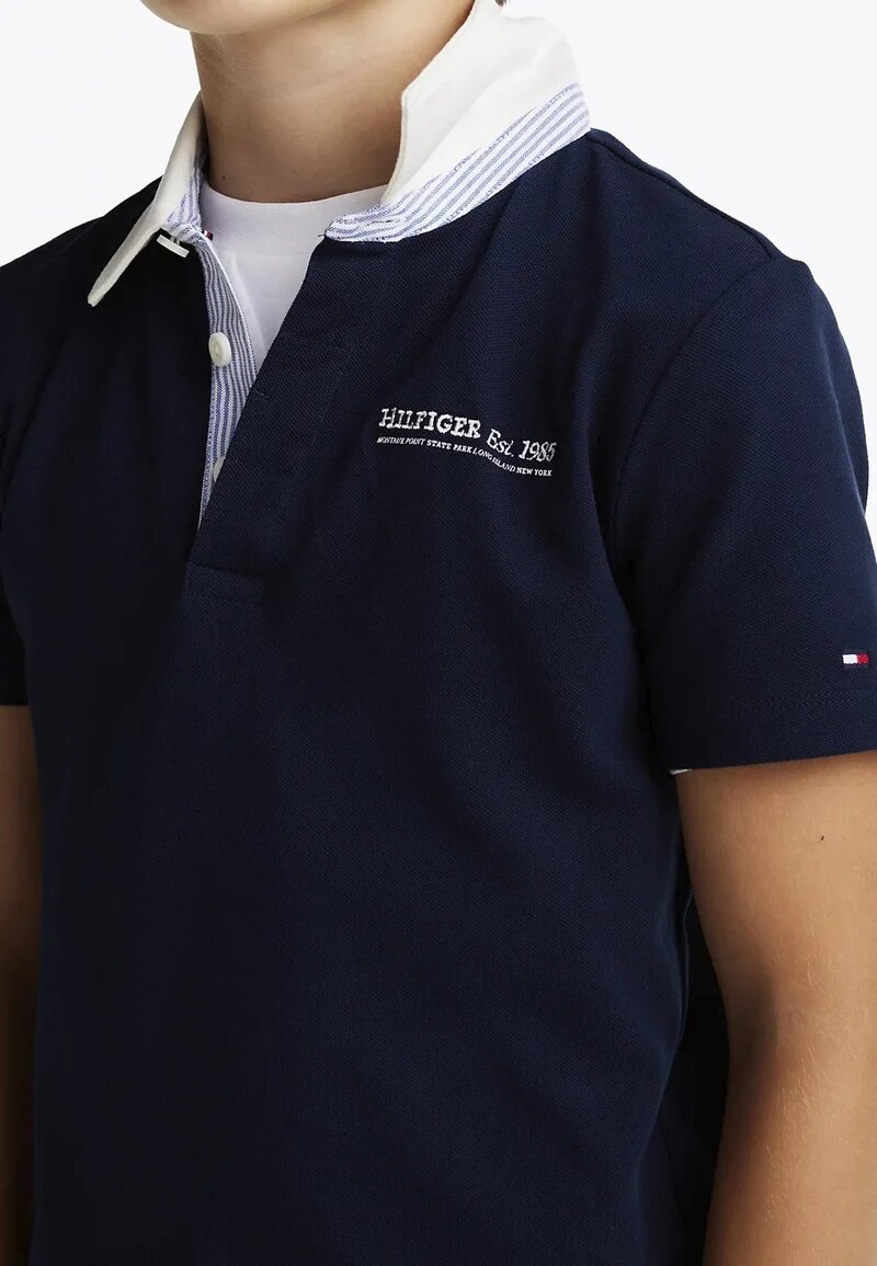 Polo blu Tommy Hilfiger bambino con colletto bianco | CammarataMode
