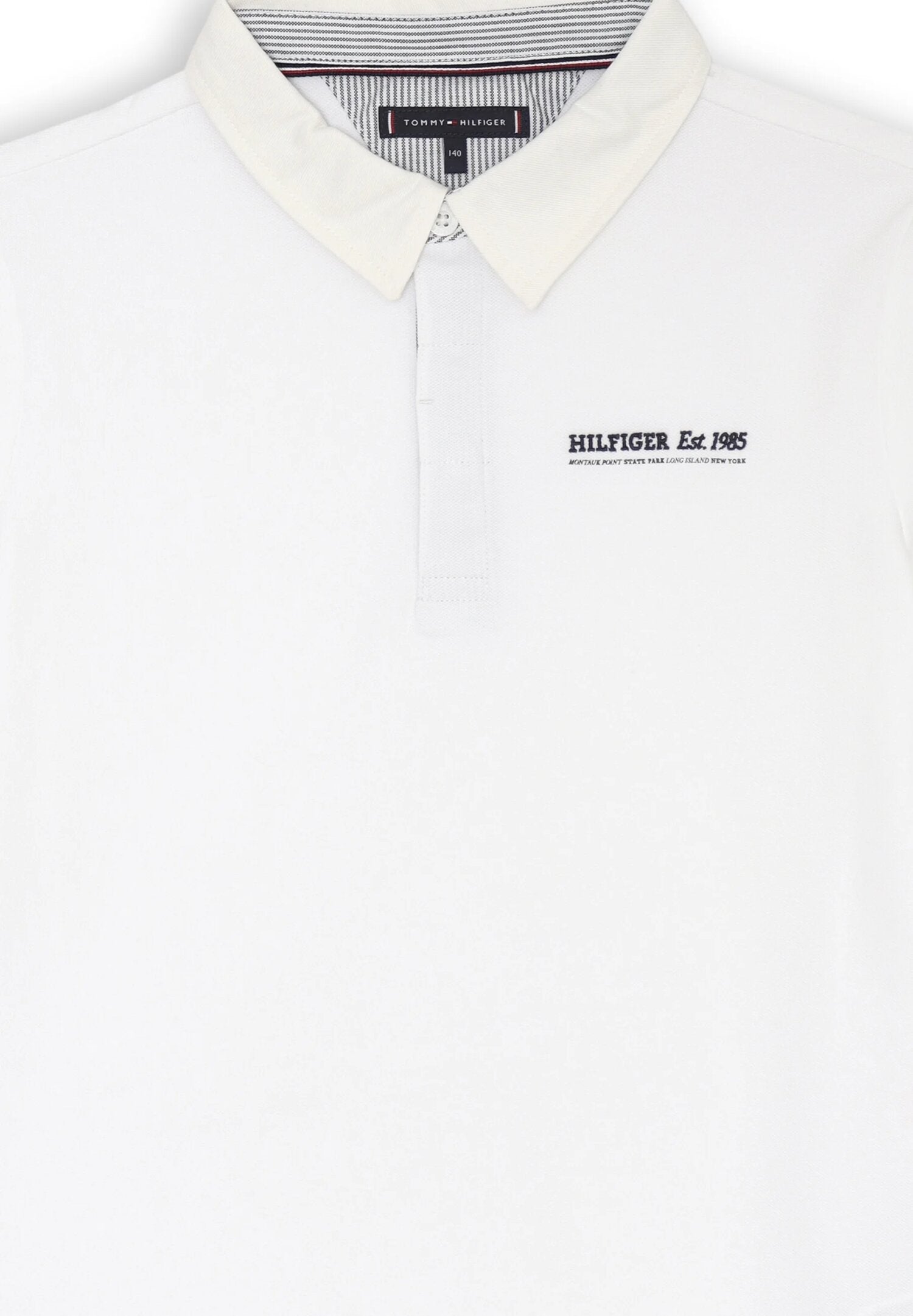 Polo bianca bambino Tommy Hilfiger con colletto panna e ricamo | CammarataMode
