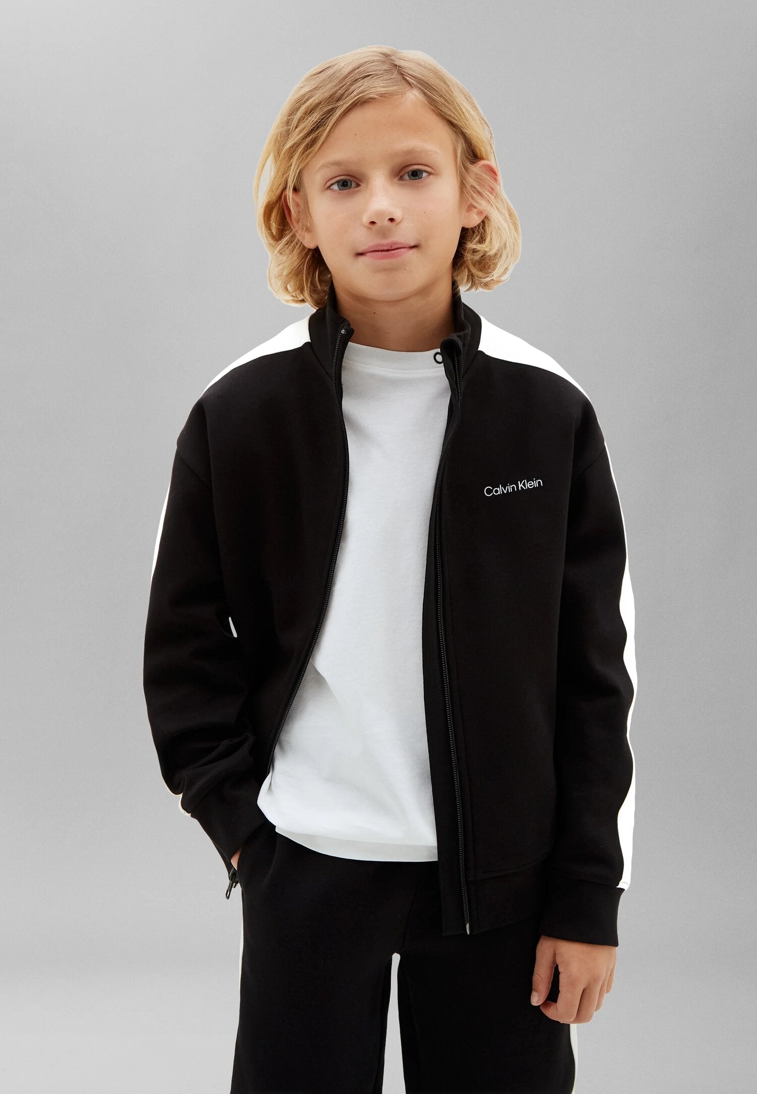 Calvin Klein Tuta Nera Con Giacca Zip Strisce Panna Bambino LVCKTJI17BBEH_
