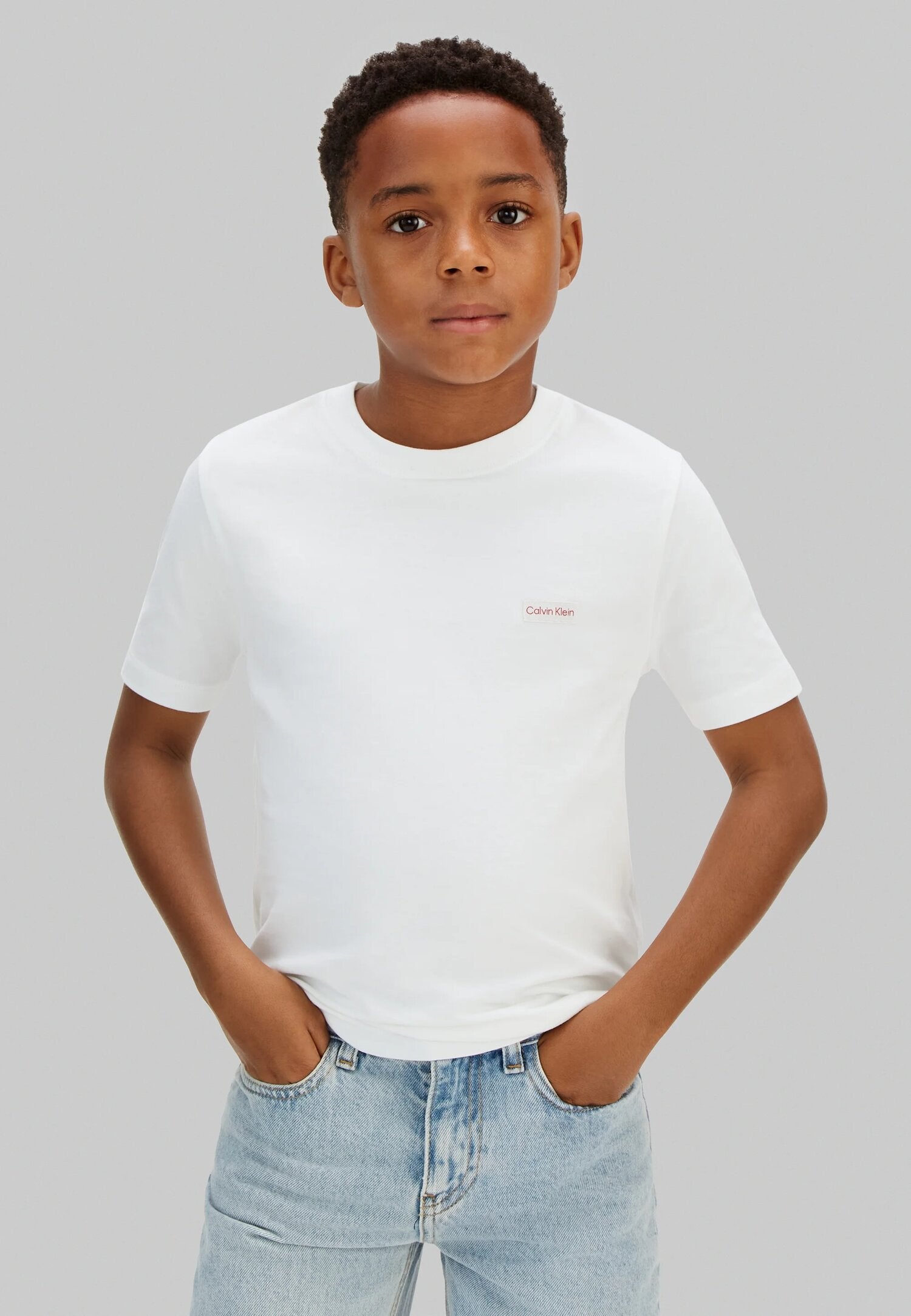 Calvin Klein Tshirt Bianca Con Logo Patch Piccolo Bambino LVCKSJA08BYAF_