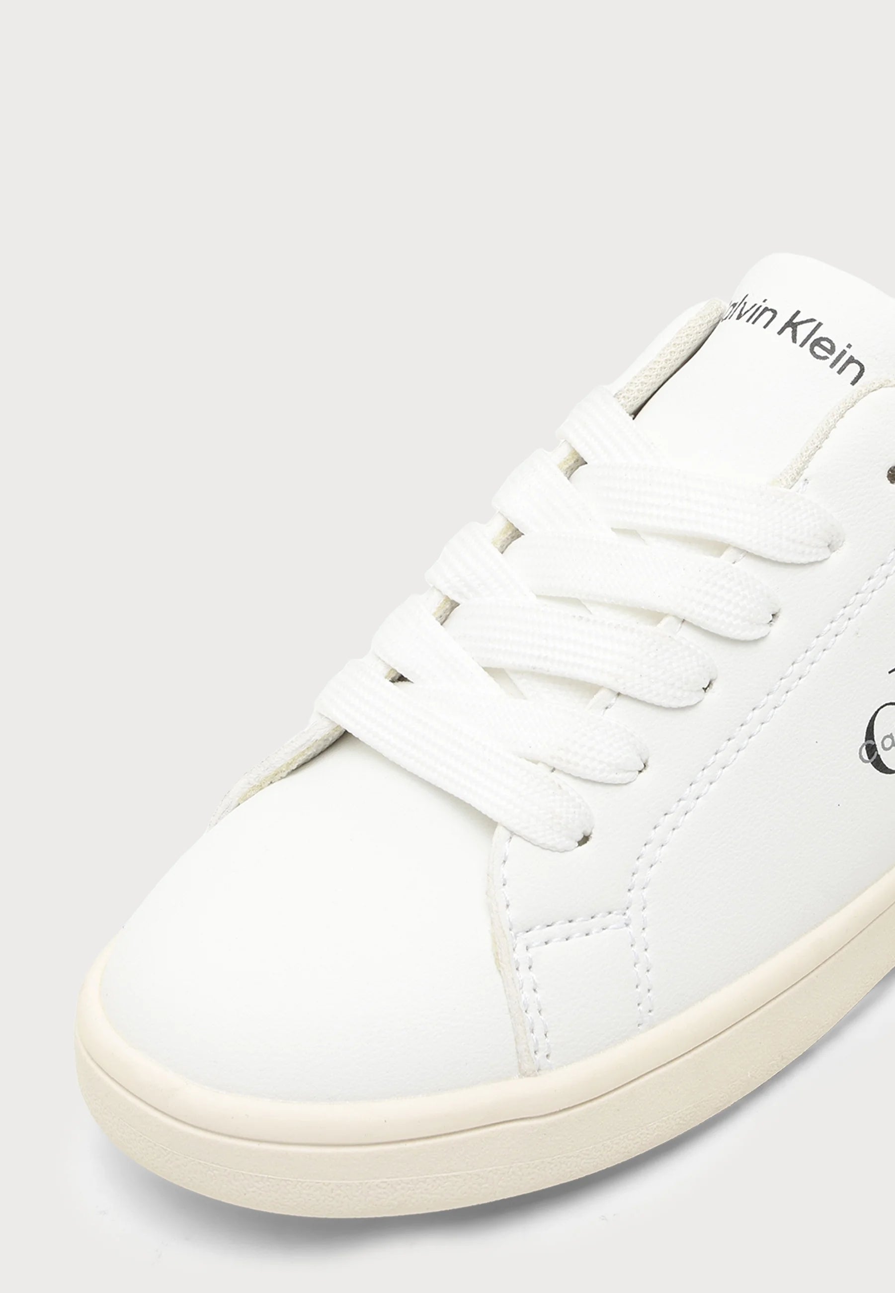 CALVIN KLEIN SCARPA BIANCA CON DETTAGLIO NERO SUL RETRO E LOGO LATERALE Bambini e ragazzi 222-V3X9-89447-1355Y631.BIA_