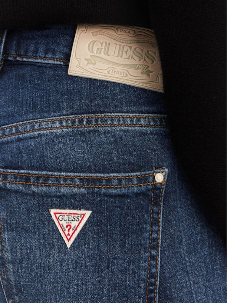 Guess pantalone in denim scuro donna patch logo sul retro retro