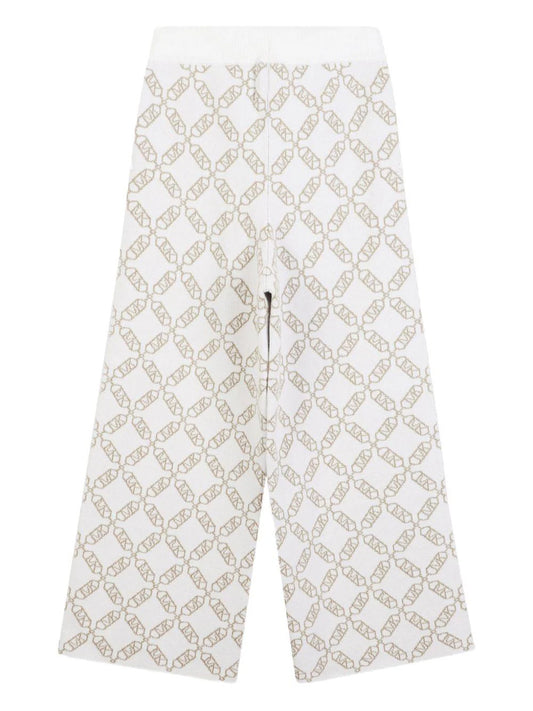 Pantaloni sportivi per bambina Michael Kors Kids bianchi con monogramma